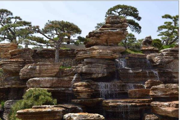 水池假山景觀設(shè)計哪里有（水池假山價格）